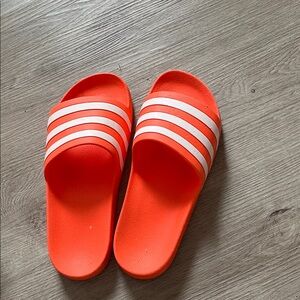 Adidas Bright Orange Slides with White Stripes